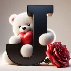 a teddy bear holding a heart in front of the letter j with a red rose