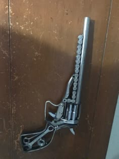 Western style gun sculpture made from old tools, car parts, and scrap metal. Cute Metal Projects, Welding Projects Wall Decor, Wire Welding Projects, Welded Projects Ideas, Cool Metal Art, Fun Welding Projects Ideas, Spot Welding Projects, Funny Welding Projects, Welding Design Ideas