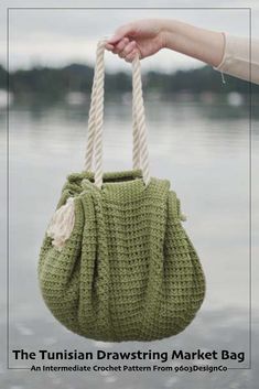 a hand holding a green crocheted bag over water with the text, the turkish drawing market bag