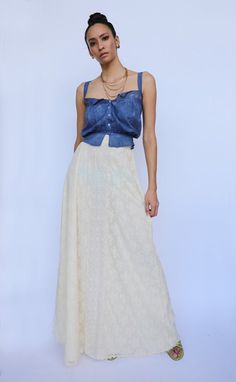 Gorgeous 1960's cream lace maxi skirt. Fully lined. Perfect for a more casual wedding orrrr whatever! For the antique indigo cami, go here: https://www.etsy.com/listing/791098521/antique-cropped-blouse-crochet-indigo?ref=shop_home_active_3Waist: 25"Hips: 38"Length: 47"Circa: 1960's Condition: Good vintage condition. Normal wear. Follow us on IG--->>>instagram.com/closetcasevintagePlease read our store policies. All sales final. Fitted Long Skirt In Off White, Spring Wedding Lace Maxi Skirt, Party Skirt With Cream Color And Lace Trim, Party Skirt With Cream Lace Trim, Cream Party Skirt With Lace Trim, Vintage Long Lace Skirt, Cream Lace Trim Bottoms For Wedding, Floor-length Bottoms For Spring Wedding, Cream Fitted Maxi Skirt With Lining