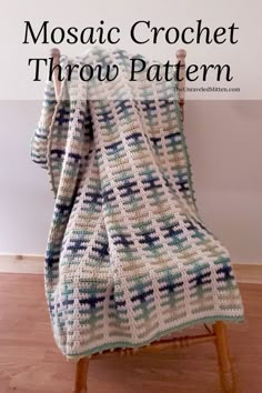 a crocheted blanket sitting on top of a wooden chair