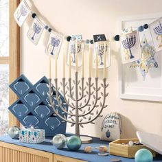 a hanukkah menorah is displayed on a table