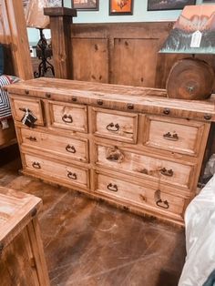 an old wooden dresser sitting in a room