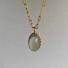 Dreamy sage green light beams from within this entrancing moonstone, grasped by Rosanne Pugliese's stunning scallop prong setting. 18k yellow gold Moonstone 12mm x 19mm (1/2" x 13/16") Pendant can be purchased alone or with the following chain options: • 22k yellow gold link chain, 18" long • 14k medium link chain, adjustable 17.5" & 19" • 14k medium link chain, adjustable 18.5" & 21" • 14k fine chain, adjustable 18" & 22" Sage Green Light, Gold Link Chain, Design Movements, Newport Ri, Gold Link, Light Beam, Cabochon Pendant, Green Light, 22k Gold