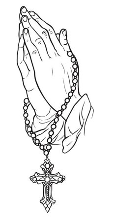 the hands of an person holding a rosary