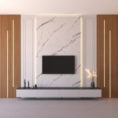 a living room with marble walls and a tv mounted on the wall in front of it