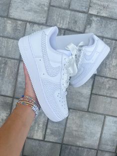 Blinged out bridal Air Force 1 sneakers personalized for the brides special day 👰🏻 **PLEASE READ LISTING CAREFULLY**  SNEAKERS: This listing if for Nike Air Force 1, if you would like something different please message me :) Personalization section please add: *your name  *date of wedding *if you want them without any customization please type (no customization) NOTE: A proof of your lettering will be sent to you within 72 hours of purchasing, please check your messages to approve image. If seller does not hear back within another 48 hours will proceed with shoes accordingly.  Price breakdown: *Full Shoe $290      -This option includes all white pearls on 4 Nike symbols both inner and outer sides, back heel and front toe area as shown in photos. This option is with regular laces. Name & Air Force 1 Wedding, Sneaker Wedding, Wedding Sneakers For Bride, Air Force Wedding, Wedding Shoes Sneakers, Bridal Sneakers, Nike Symbol, White Air Force 1, Air Force 1 Sneakers