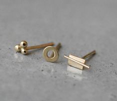 14k gold handmade stud earrings, beautiful everyday staple earrings, suitable for a second or third Piercings. Pick your favorite pair or mix & match. * Each earring is unique and hand-made in my studio. * Silicone bracket. gold bracket can be ordered for an additional fee - https://www.etsy.com/il-en/listing/502714244/14k-gold-bracket-14k-gold-earring?ref=shop_home_active_1. * Finish- Matte or Shiny. * Can be made in yellow, white or rose 14k gold. * All jewelry will be sent in a beautiful Mens Diamond Stud Earrings, Staple Earrings, Tiny Gold Studs, Black Diamond Earrings Studs, 14k Gold Wedding Ring, Yellow Gold Stud Earrings, Gold Diamond Studs, Minimalist Earrings Studs, Soldering Jewelry