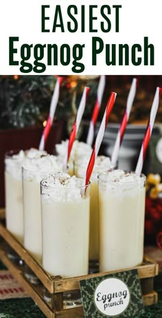 eggnog punch recipe in glasses with red and white straws on the side