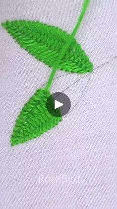 the video shows how to make an embroidered leaf