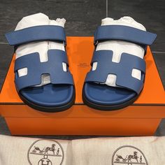 Hermes Womens Chypre Sandals Eu 37 Us 7 Bleu Bleuet Bnib Modern Blue Slip-on Sandals, Blue Slip-on Modern Sandals, Blue Modern Slip-on Sandals, Luxury Blue Sandals For Summer, Modern Blue Sandals With Cushioned Footbed, Luxury Blue Sandals With Removable Insole, Designer Blue Sandals With Round Toe, Designer Blue Slides With Branded Insole, Luxury Blue Slides For Summer