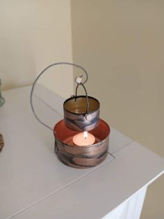 a candle that is sitting on top of a table