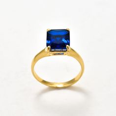 Gold Sapphire Ring set with Created Sapphire in a perfect radiant cut, flawless clarity & royal blue color, at 10x8mm (4 Cts).Gold Vermeil: 18k Gold over Solid 925 Sterling Silver ☞ made to last.Click here for ☞ Matching PendantMatching Earrings ☞ please ask meClick here for ☞ Sapphire Jewelry CollectionDetails:• Created Sapphire in a flawless clarity• Sapphire: 10x8mm, 3 Cts, radiant cut• Dimensions: Band width ≈ 2.3mm, thickness ≈ 1.2mm• 18k Gold VermeilSKU 1059 Gold Sapphire Ring With Radiant Cut For Gift, Gold Radiant Cut Sapphire Ring Gift, Gold Sapphire Ring With Radiant Cut For Formal Occasions, Elegant Gold Sapphire Ring Radiant Cut, Gold Radiant Cut Sapphire Ring For Formal Events, Square Cut Sapphire Ring For Formal Occasions, Blue Radiant Cut Rings For Formal Occasions, Formal Gold Sapphire Ring With Radiant Cut, Classic Blue Square Cut Rings