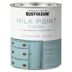 a can of milk paint with blue drawers