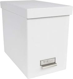 a white box with a metal handle on it