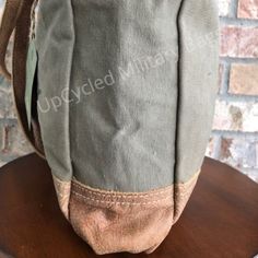 Oriver Winery Bag is constructed of repurposed sustainable military tent canvas. Strong and sturdy ready to go on your next shopping spree, run about town or a trip though wine country. Durable enough to make every day an adventure and classy enough to impress while doing it. Perfect size for the necessities and more. Superb gift for yourself or the wine enthusiast in your life, or those that just love a nice size bag that is versatile and looks great! Use as small travel bag, everyday purse, sh Grey Hair Celebrities, Best Beach Bag, Every Day Bag, Military Bag, Small Travel Bag, Military Mom, Everyday Purse, Canvas Purse, Size Matters