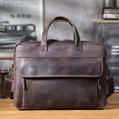 Vintage 17“ Leather Briefcase Full Grain Leather Messenger Bag Men Leather Travel Laptop Bag, Crossbody Bag A Full grain leather briefcase that expresses perfect harmony between hard and soft. Top-quality full grain leather gives a sentimental feel, but the lines convey a light touch of modern. Timeless and current. Urban practicality with charisma.Briefcases for men are more than an accessory. A leather briefcase bag is an extension of who you are and what you believe in. When we craft leather briefcase bags for men, they are designed to securely house what’s necessary for taking care of business. Practicality is included, as this design snugly fits your 17" laptop, features spacious inner pocket for pens or phone.Leather briefcase for men can be a great addition to any outfit and an exce Leather Briefcase Bag, Messenger Bag Leather, Leather Messenger Bag Men, Laptop Travel Bag, Briefcase Bag, Leather Briefcase Men, Leather Suspenders, Dark Coffee, Leather Laptop Bag