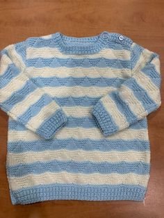 Super soft knitted jumper, perfect for cool autumn days. Suitable for 18m-2yo Cute Textured Knit Sweater For Winter, Cute Textured Knit Winter Sweater, Playful Knitted Long Sleeve Tops, Playful Knitted Crew Neck Top, Playful White Knit Sweater, Playful Crew Neck Knitted Sweater, Cute Hand Knitted Blue Sweater, Cute Blue Hand-knitted Sweater, Cute Blue Hand Knitted Sweater