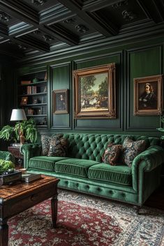 a living room with green couches and paintings on the wall, rugs and table