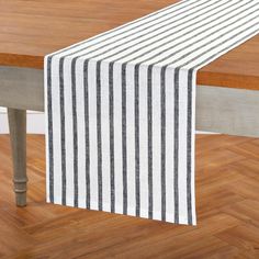 Part of our Madison collection, this table runner is accented with a statement stripe and made for casual, formal, indoor and outdoor entertaining. Hand-made of 100% pure European linen and tailored with mitered corners, this linen table runner pairs beautifully with coordinating stripe linens or any of our solid color collections. Available in a wide variety of sizes.