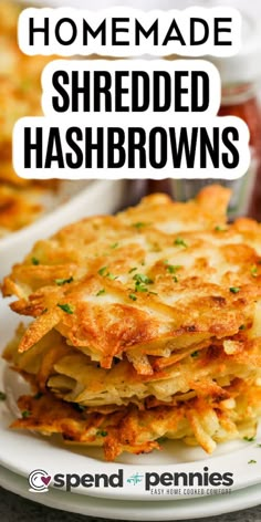 homemade shredded hashbrowns stacked on a plate with ketchup in the background