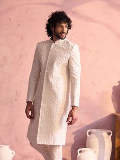 SHRESTHA By VASTRAMAY Men's Cream Georgette Embellished Indo Only Top White Long Sleeve Sherwani For Party, White Long Sleeve Party Sherwani, Fitted White Sherwani For Party, Elegant White Sherwani For Spring, Designer Fitted Sherwani For Spring, Fitted Sherwani For Festive Spring Occasions, Embellished Fitted Sherwani With Long Sleeves, Elegant Spring Sherwani With Floral Embroidery, Fitted Long Sleeve Embellished Sherwani