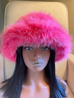 This beautiful incredibly soft faux fur hat is a must have for the fall and winter season.It is stylish and warm and can be dressed up or down. The head circumference of the hat is about 22-23inches (56-60cm) so almost everyone should fit :) The hat is made out of Vegan Fur and is super soft and fluffy:) For any different color requests please send me an email:) Faux Fur Hat With Short Brim, Faux Fur Trimmed Hat With Short Brim, Fluffy Faux Fur Wide Brim Hat, Faux Fur Hats With Short Brim, Faux Fur Trim Hat With Short Brim, Short Brim Faux Fur Hats, Winter Pink Bucket Hat, One Size, Adjustable Winter Hat With Feather Trim, Winter Hats With Faux Fur Lining