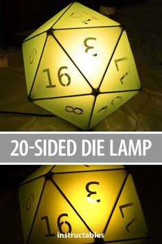 a light up dice with numbers on it and the words, 20 sided die lamp