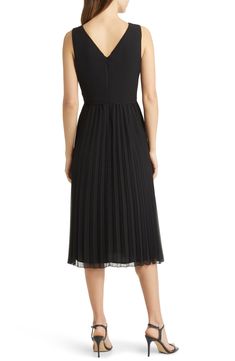 Designed in a sleeveless silhouette, this day-to-night dress is punctuated with a pleated chiffon skirt. 46" length (size 8) V-neck Sleeveless Lined 100% polyester Dry clean Imported Black A-line Dress With Accordion Pleats, Black Pleated Skirt Dress For Evening, A-line Sleeveless Dress For Cocktail With Pleated Waist, Black Evening Pleated Dress With Pleated Skirt, Black Evening Pleated Dress, Cocktail A-line Sleeveless Dress With Pleated Waist, Black Evening Dress With Pleated Skirt, Dressy Sleeveless Pleated Evening Dress, Dressy Sleeveless Pleated Dress For Evening