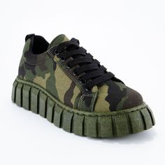 These adorable sneakers are sure to make any outfit pop. Featuring a camouflage detail. Casual Sneakers With Lug Sole And Round Toe, Green Fall Sneakers For Streetwear, Green Sneakers For Fall Streetwear, Green Fall Streetwear Sneakers, Trendy Outdoor Sneakers For Fall, Trendy Fall Sneakers With Textured Sole, Sporty Fall Sneakers With Lug Sole, Casual Green Platform Sneakers With Contrast Sole, Fall Streetwear Sneakers With Lug Sole