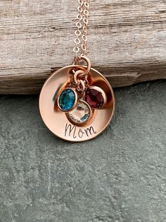 Made to order ~ Photo is an example, your necklace will be personalized to order.A 7/8 inch 14k rose gold filled disc is personalized with name of choice up to 10 letters. Specify name and birthstone months in personalization field.*January and July are the same color.Chain is a 14k rose gold filled cable chain with spring ring clasp, choose length from drop down menu.See more of my shop herehttps://www.etsy.com/shop/BeachCoveJewelryThis item has been hand stamped with metal stamps and a hammer Personalized Rose Gold Birthstone Necklace For Mother's Day, Customizable Round Rose Gold Charm Necklace, Rose Gold Birthstone Name Necklace For Anniversary, Personalized Rose Gold Birthstone Necklace For May, Personalized Rose Gold Birthstone Necklace For Anniversary, Personalized Rose Gold May Birthstone Necklace, Anniversary Rose Gold Name Necklace With Birthstone, Anniversary Rose Gold Birthstone Name Necklace, Personalized Round Pendant Birthstone Necklace For Mother's Day