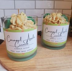 two jars filled with food sitting on top of a counter