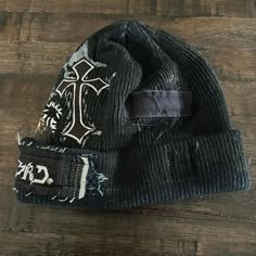 🌐TRIPLE3RD🌐 •+Staple020+• {SOLD} Custom Upcycled 1/1 Beanie Best for a smaller head Scrap patchwork all over this hat with graphic patches from: REC(2007), Death Note, & Din of Celestial Birds. Silkscreened logo print patch at cuff. Cross patch sewn on. Metallic paint detailing & black paint coating. Handmade tag🏷️ All orders come with stickers and care instructions! Tag me if you take any pics❤️‍🔥 Dm to tap into custom work🫡 _____________________ #bespokefashion #undergroundfashion #requ... Scrap Patchwork, Punk Style Outfits, Cross Patch, Snowman Svg, Funny Snowman, Accessory Inspo, Diy Clothes Design, Concept Clothing