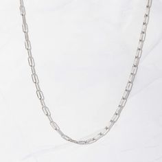 Very trendy at the moment - paperclip necklace. It's dainty and great layered or alone. Made of 925 Sterling Silver Plated in a THICK plating of 14k Gold for a piece that will last you years to come 16" Chain + 2.5" Extension chain Lobster Clasp Closure Nickel-free and hypoallergenic Thickness: 3.7mm Minimalist White Gold Necklace With Paperclip Chain, Everyday Paperclip Chain Link Charm Necklace, Minimalist Silver Charm Necklace With Paperclip Chain, Everyday White Gold Paperclip Chain Necklace, Dainty Silver Charm Necklaces With Paperclip Chain, Dainty Silver Charm Necklace With Paperclip Chain, Silver Paperclip Chain Charm Necklace For Everyday, Silver Charm Necklace With Paperclip Chain For Everyday, Sterling Silver Delicate Chain Necklace Paperclip Shape