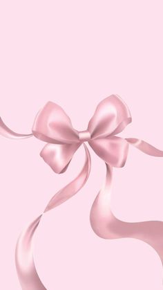 a pink background with a large bow on it's side and ribbon in the middle