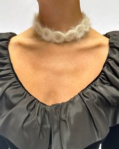 This vintage choker is one of the most fun pieces I've come across in recent memory! Made in the 1960s, it consists of ivory angora, crocheted in rings, with an ornate gold clasp in the back. This is one of those statement pieces that makes any outfit a LOOK- it's even fun layered with longer chains, as shown. (The Antique Victorian Locket (https://verybreezy.com/products/antique-french-black-enamel-and-gold-locket) pictured is also available, as well as the Vintage Givenchy Dress (https://verybreezy.com/products/vintage-givenchy-couture-long-sleeve-velvet-gown) ) It measures 15-15.25" long x 1" tall. Great vintage condition. With any questions about the specific condition or size, please send me a message for additional photos or measurements, or email shop@verybreezy.com Visit us for mor Fur Choker, Holiday Sweater Party, Givenchy Couture, Givenchy Dress, Victorian Locket, 1960s Jewelry, Vintage Givenchy, Vintage Choker, Velvet Choker