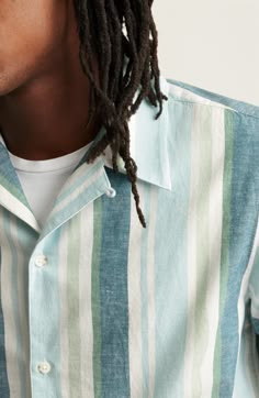 Softly brushed oxford cloth woven from cotton and hemp keeps you feeling casual and comfortable in a camp shirt patterned in bright, sunny stripes. Front button closure Convertible collar Short sleeves 73% cotton, 27% hemp Machine wash, tumble dry Imported Mens Knit Sweater Pattern, Outfits With Striped Shirts, Woven Shirts, Mens Knit Sweater, Mens Smart Casual Outfits, Check Shirt Man, Poolside Party, Convertible Collar, Smart Casual Men