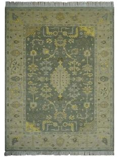 This hand-knotted Oriental Oushak wool rug is perfect for any decor setting. The multi-dimensional design features a combination of green, olive and mustard colors which lend to its exotic, yet modern appeal. Crafted to perfection through the traditional Oushak knotting technique, its soft and durable wool material. Wall Panels Bedroom, Brown Furniture, White Cloth, Combination Of Colors, Manufactured Stone, Basket Organization, Mirrored Nightstand, Peel And Stick Tile, Green Olive