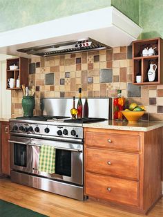 a stove top oven sitting inside of a kitchen next to a wooden counter tops and cabinets