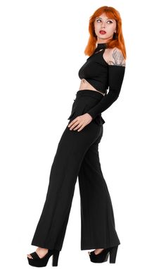 The moon made me do it. Loretta is an elegant pair of trousers designed for the stylish and refined woman. Made from a blend of materials consisting of 65% rayon, 30% polyester, and 5% spandex, these pants are not only beautiful but also wrinkle-resistant, ensuring they look perfect throughout the day. The incredibly high waist of these trousers not only has the ability to slim the silhouette but also elongate the legs, imparting elegance and confidence. The concealed zipper with a crescent moon-shaped pull adds a unique charm and a touch of mystery. Furthermore, these pants are equipped with practical side pockets for convenient storage of essentials. The flared seams towards the bottom give these trousers a light and elegant look, creating a bell-bottom effect that is both fashionable an Elegant High-waisted Viscose Pants, Viscose Evening Trousers, Evening Viscose Trousers, Formal Viscose Ankle-length Pants, Formal Ankle-length Viscose Pants, Stretch Viscose Ankle-length Wide Leg Pants, Elegant Black Viscose Pants, Elegant Stretch Viscose Pants, Formal Viscose Trousers