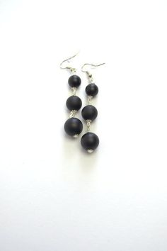 Simple and Elegant black Onyx drop earrings Elegant earrings made of high quality natural matt black onyx - simple and beautiful.This earrings is a good accessory for work or everyday use. Dress these up or down; a great basic.Most of my jewelry can easily be resized at no additional charge. I would love to assist you with your custom order, so please do not hesitate to contact with me.All my earrings is made with care and handmade.Earrings details:Length: Long dangle earrings measure 55 mm from Stackable Gemstone Rings, Opal Band Ring, Black Onyx Jewelry, Healing Crystal Ring, Black Onyx Earrings, Gem Earrings, Earrings Summer, Goth Jewelry, Onyx Jewelry