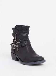 a pair of black boots with buckles on the side