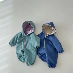 Wrap your baby in warmth with our Warm Hooded Fleece Romper! ❄️ Ideal for 6-24 months, this unisex romper is perfect for winter. Soft cotton and a hooded design make it a cozy choice for baby winter outfits! #BabyWinterWear #FleeceRomper #UnisexBabyClothes Winter Cotton Onesie, Blue Hooded Onesie For Winter, Blue Hooded Winter Onesie, Cozy Solid Color Onesie For Winter, Cozy Solid Onesie For Winter, Cotton Hooded Onesie For Playtime, Hooded Cotton Onesie For Playtime, Winter Onesie For Playtime, Cotton Hooded Onesie For Fall