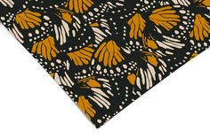 an orange and black butterfly print tie on a white background