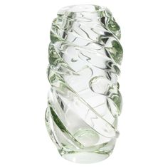 This tall, elegant Murano glass vase epitomizes modern sophistication while celebrating the rich heritage of traditional glass-blowing techniques. Standing as a testament to Murano’s master artisans, its unique, twisted design gracefully spirals around the clear glass body, creating a mesmerizing interplay of light and shadow. Delicate hints of green weave through the glass, adding a touch of freshness and subtle color, enhancing its visual appeal. Meticulously crafted with precision and care, t Owl Vase, Murano Glass Vase, Painted Vases, Vases And Vessels, Porcelain Vase, Traditional Techniques, Light And Shadow, Murano Glass, Decorative Objects