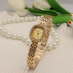 Product information: Color: gold shell gold surface, gold shell green surface, 6334 gold surface white diamond, 6334 rose gold white surface, 6334 silver white surface, 6334 gold green surface, 6346 light gold white shell E... Packing specification: 1 Applicable people: Female Style: vintage diamond Mirror material: Hardened mineral glass Watch buckle style: Jewelry buckle Buckle Material: Metal Watch strap material: metal Dial shape: diamond Case Material: Metal Packing list: Watch x1 Product Image: Chain Watch, Glam Waves, Diamond Mirror, Metal Watch, Mirror Material, Gold Luxury, Gold Face, Female Style, Dress Gold