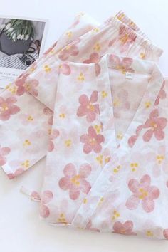 Embrace floral elegance with our Women's Floral 2-Piece Kimono Pajama Set! 🌸 Dive into luxurious comfort with this chic ensemble, perfect for lazy mornings or cozy evenings at home. Elevate your loungewear game with sophistication and style! 💫 #LoungewearLuxury #FloralKimono #CozyNights #Fashionista #NightwearFashion #SelfCare #MustHave #ComfortZone #ShopNow #OriginalPajamas Comfortable Matching Sleepwear Set For Spring, Comfortable Matching Set Sleepwear For Spring, Cotton Sleepwear Long Pants For Spring, Cotton Sleepwear With Elastic Waistband And Long Sleeves, Cotton Long Sleeve Sleepwear With Elastic Waistband, Comfortable Home Sets For Spring, Spring Matching Set Sleepwear For Home, Floral Print Relaxation Sets For Spring, Floral Print Sets For Relaxation In Spring