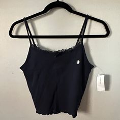 Nwt American Eagle Medium Navy Blue Cropped Tank Top Camisole Pointelle Fabric With Bow Casual Tops With Lace Trim And Tank Straps, Casual Lace Trim Camisole Top, Casual Cami Tank Top With Lace Trim, Casual Lace Cami Crop Top, Blue Cropped Camisole Casual Style, Casual Cropped Lace Top Tank, Casual Spaghetti Strap Crop Top With Lace Trim, Casual Cami Top With Lace Trim, Blue Casual Cropped Camisole