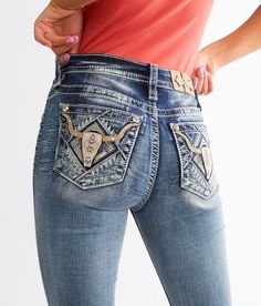 Miss Me Mid-Rise Boot Stretch Jean - Blue 33/34, Women's M898 Mid-rise Slim through the hip and thigh 18 bottom opening Rhinestones on embroidered back pockets Destruction details. This quality denim is hand-finished for a unique look. It will wear like your favorite jeans, with each hole and tear continuing to destruct over time. You will love the comfort of this denim that has the look and feel of years of wear. . 73% Cotton 24% Polyester 3% Elastane. Machine wash in cold water separately insi Western Clothing For Women, Bedazzle Jeans, Country Girl Jeans, Buckle Jeans Women, Fitted Mid-rise Jeans With Rhinestones, Miss Me Flare Jeans, Cowboy Jeans, Bedazzled Jeans, Flared Miss Me Jeans