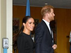 prince harry and his wife, the duke of cambridge walk through an office building in london